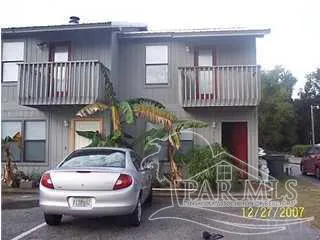 a car parked in front of a house