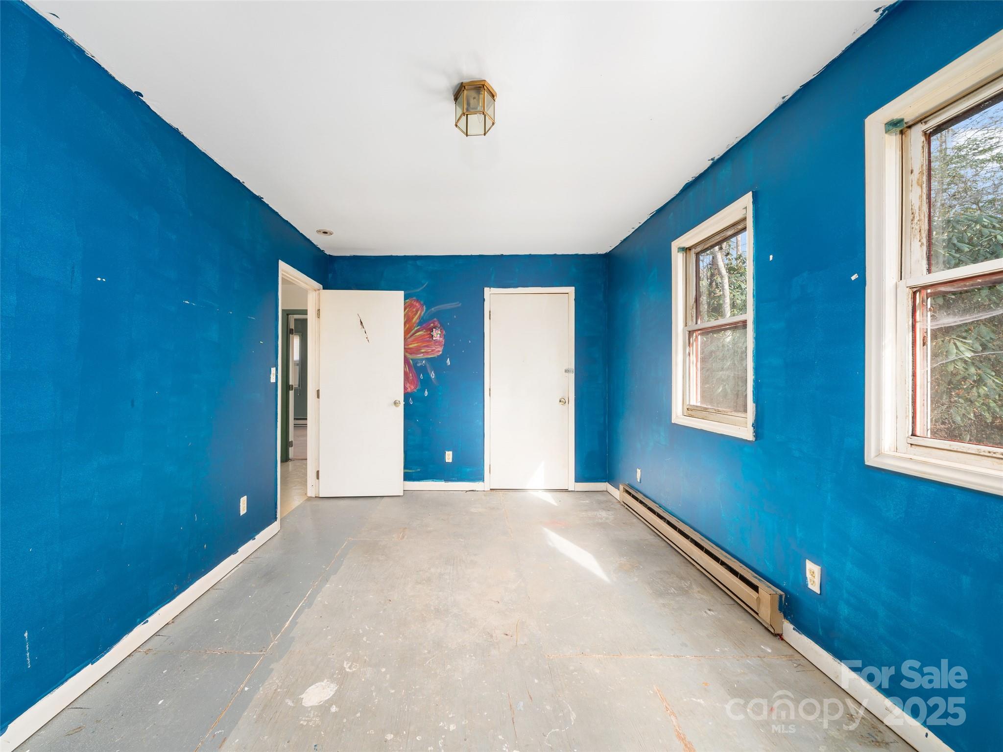 74 George Street Spruce Pine, NC 28777 - Photo 15 of 29 a view of a livingroom with a window
