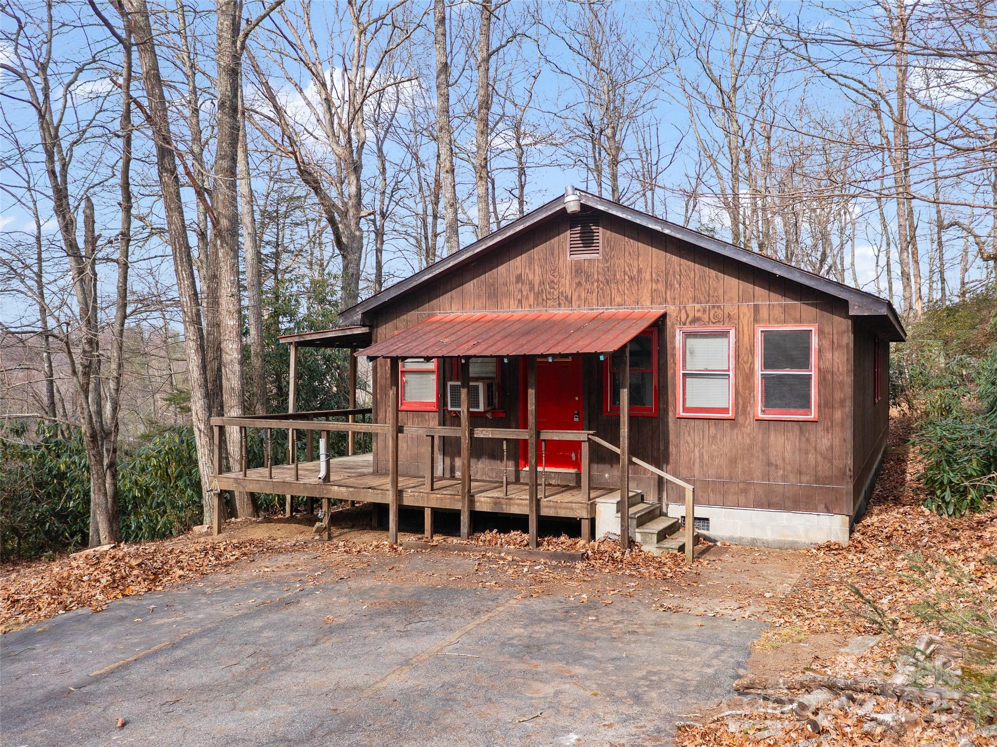 74 George Street Spruce Pine, NC 28777 - Photo 2 of 29 a front view of a house with porch