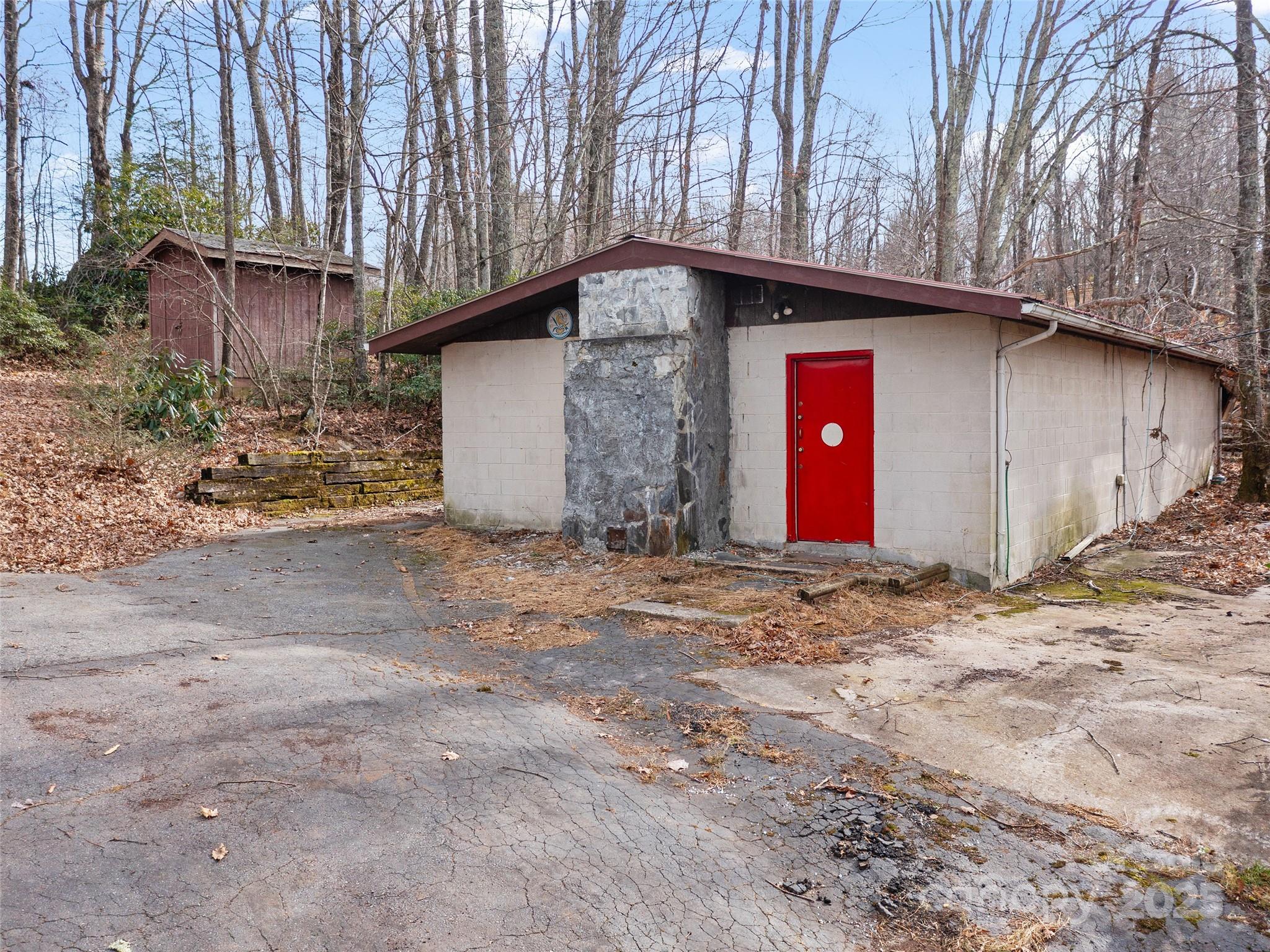 74 George Street Spruce Pine, NC 28777 - Photo 21 of 29 a front view of a house with a yard
