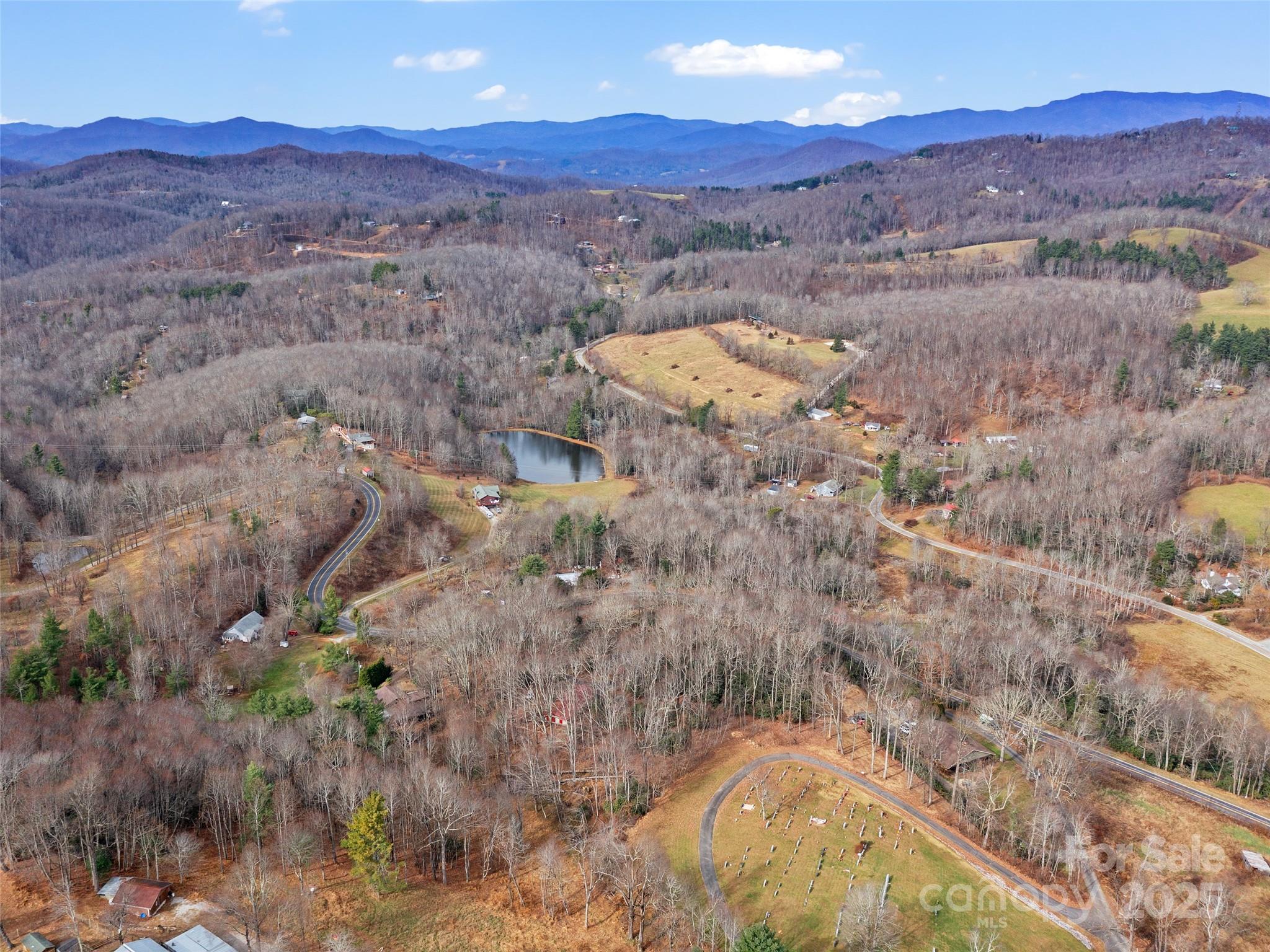 74 George Street Spruce Pine, NC 28777 - Photo 24 of 29 an aerial view of houses with yard