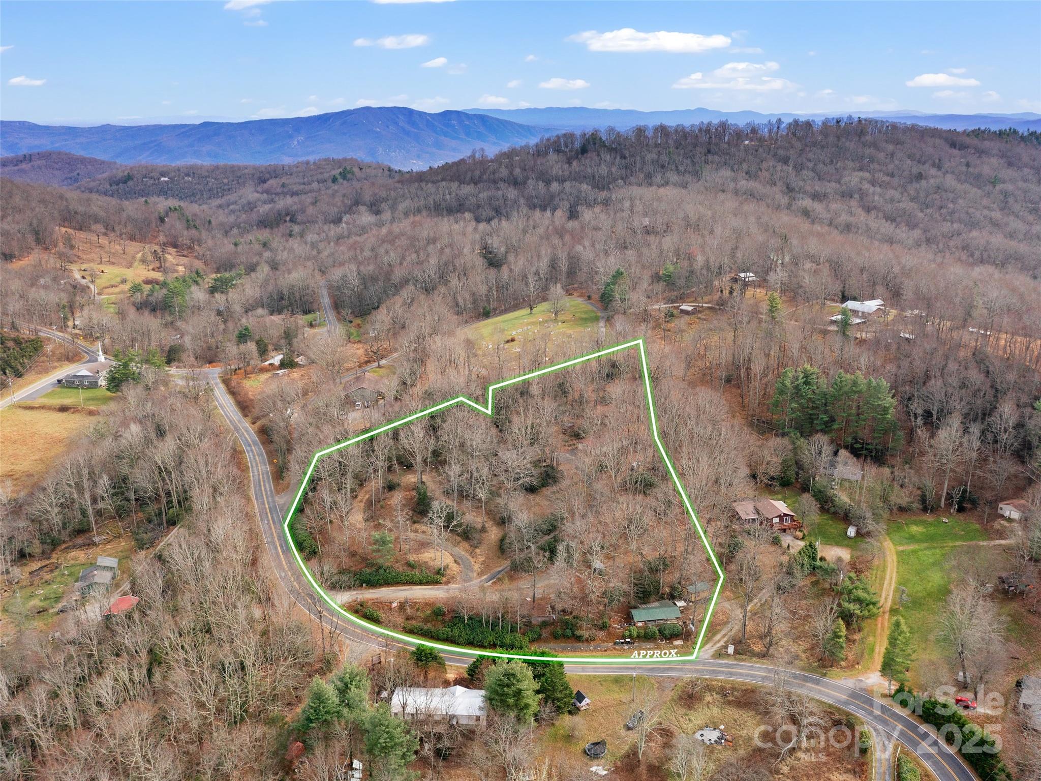 74 George Street Spruce Pine, NC 28777 - Photo 25 of 29 an aerial view of a house with a yard