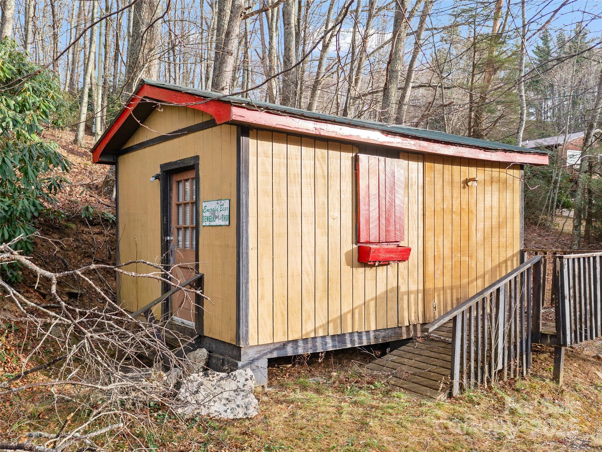 74 George Street Spruce Pine, NC 28777 - Photo 28 of 29 a front view of a house with a yard
