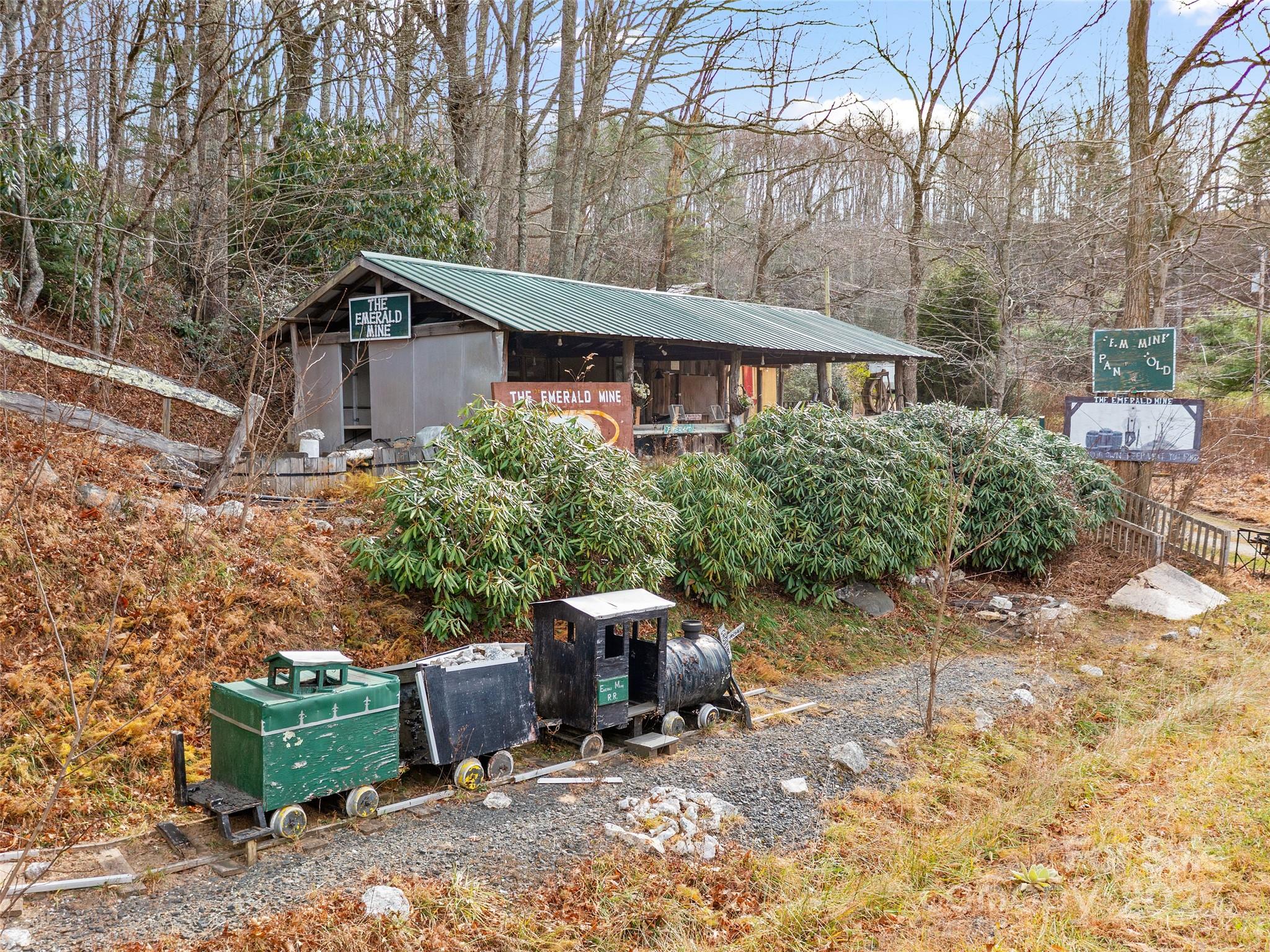 74 George Street Spruce Pine, NC 28777 - Photo 4 of 29 a view of backyard with outdoor seating and barbeque oven
