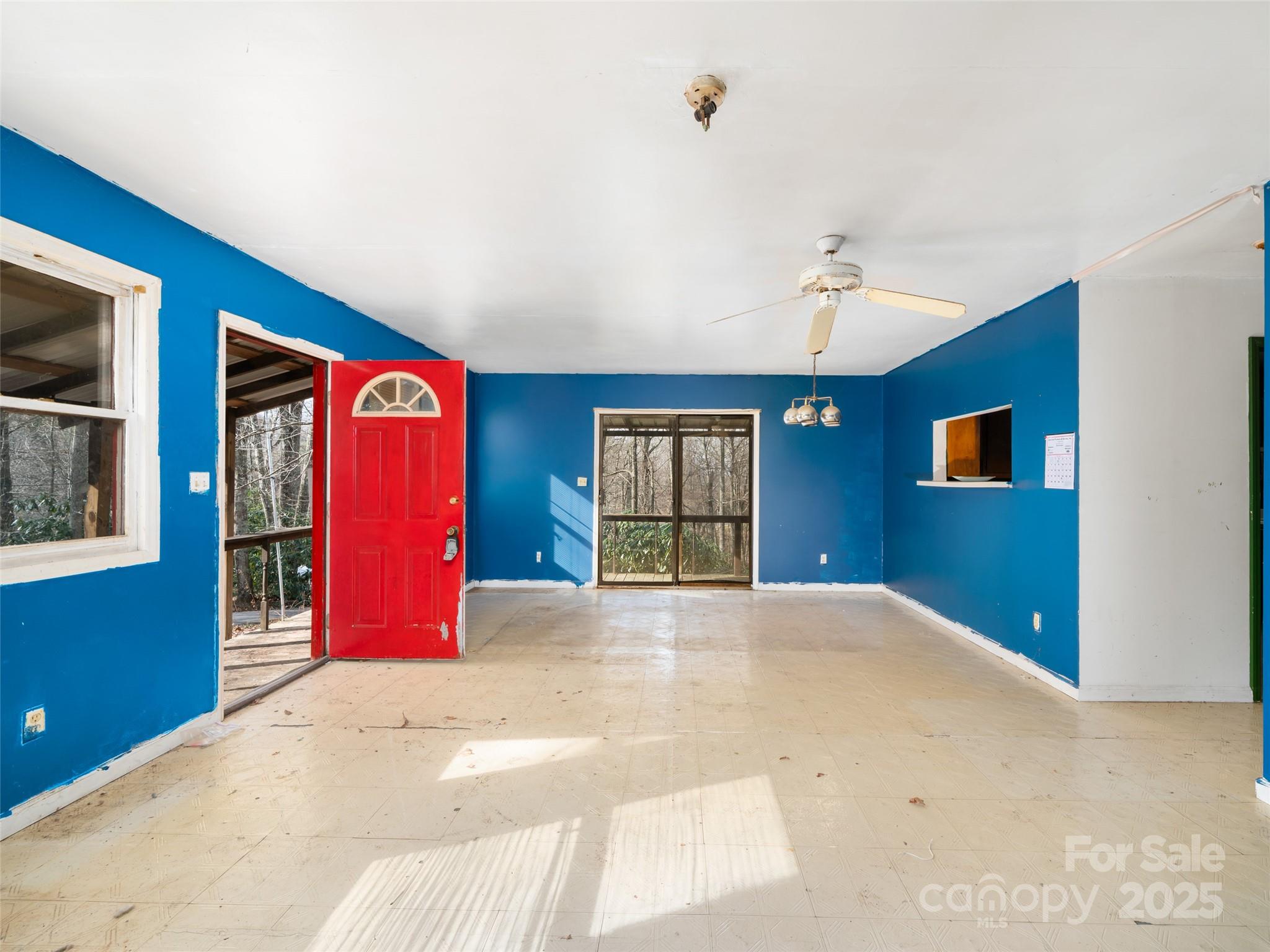 74 George Street Spruce Pine, NC 28777 - Photo 9 of 29 a view of an empty room with window and cabinet