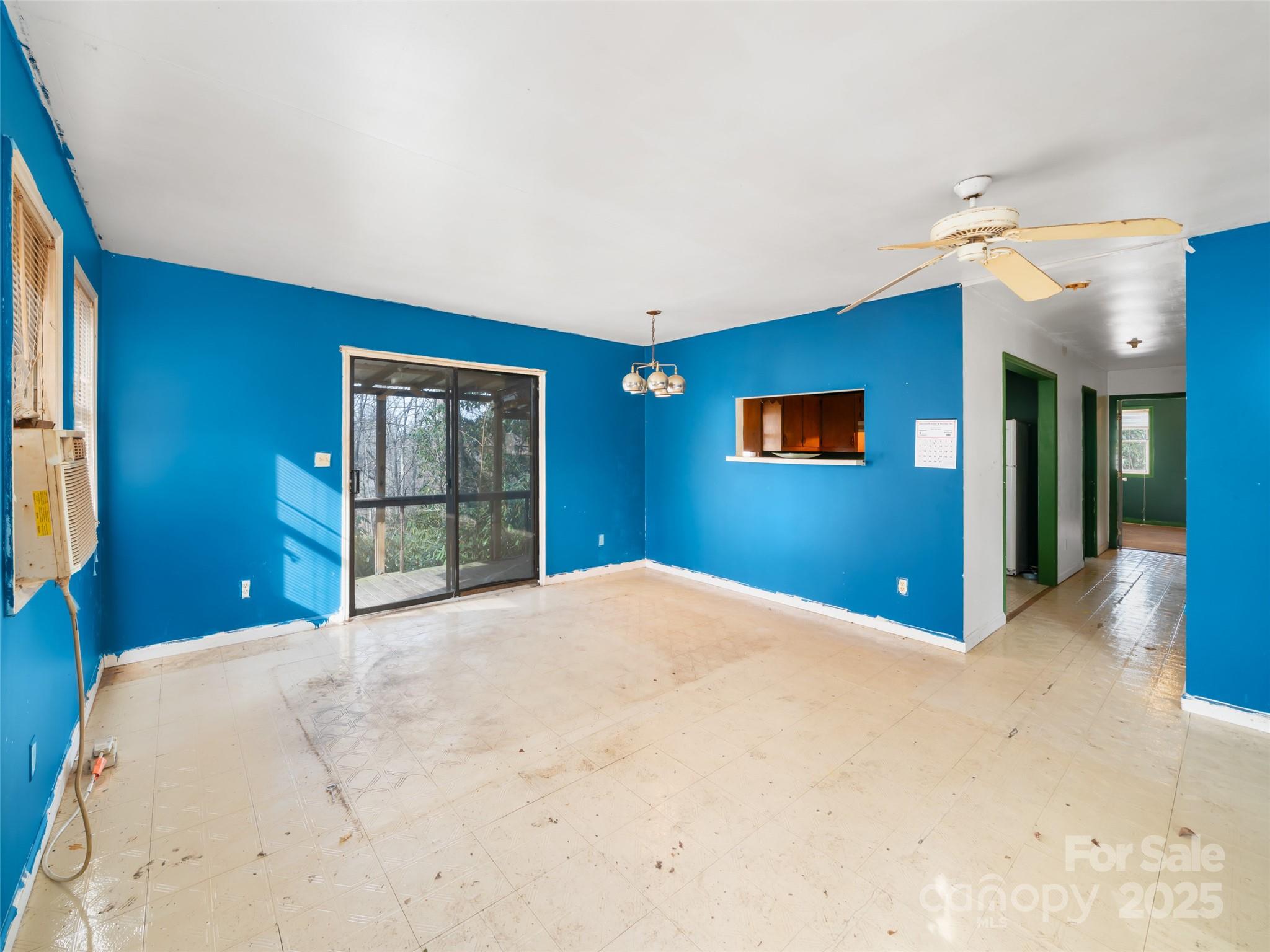 74 George Street Spruce Pine, NC 28777 - Photo 10 of 29 a bedroom with a bed and a dresser