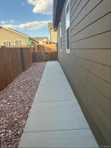 a balcony view with wooden floor