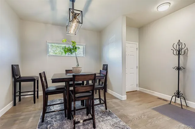 a view of a dining room with furniture