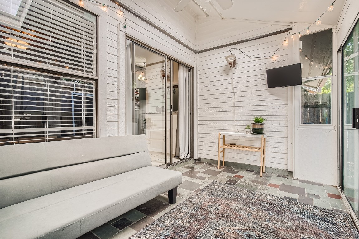 3815 Menchaca Road, Unit 9A Austin, TX 78704 - Photo 16 of 19 a backyard of a house with outdoor seating