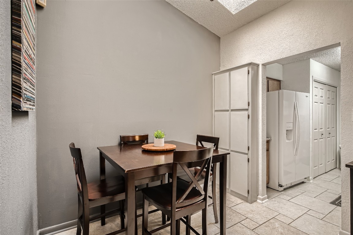 3815 Menchaca Road, Unit 9A Austin, TX 78704 - Photo 9 of 19 a view of a dining room with furniture