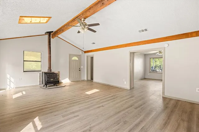 a view of a livingroom with wooden floor