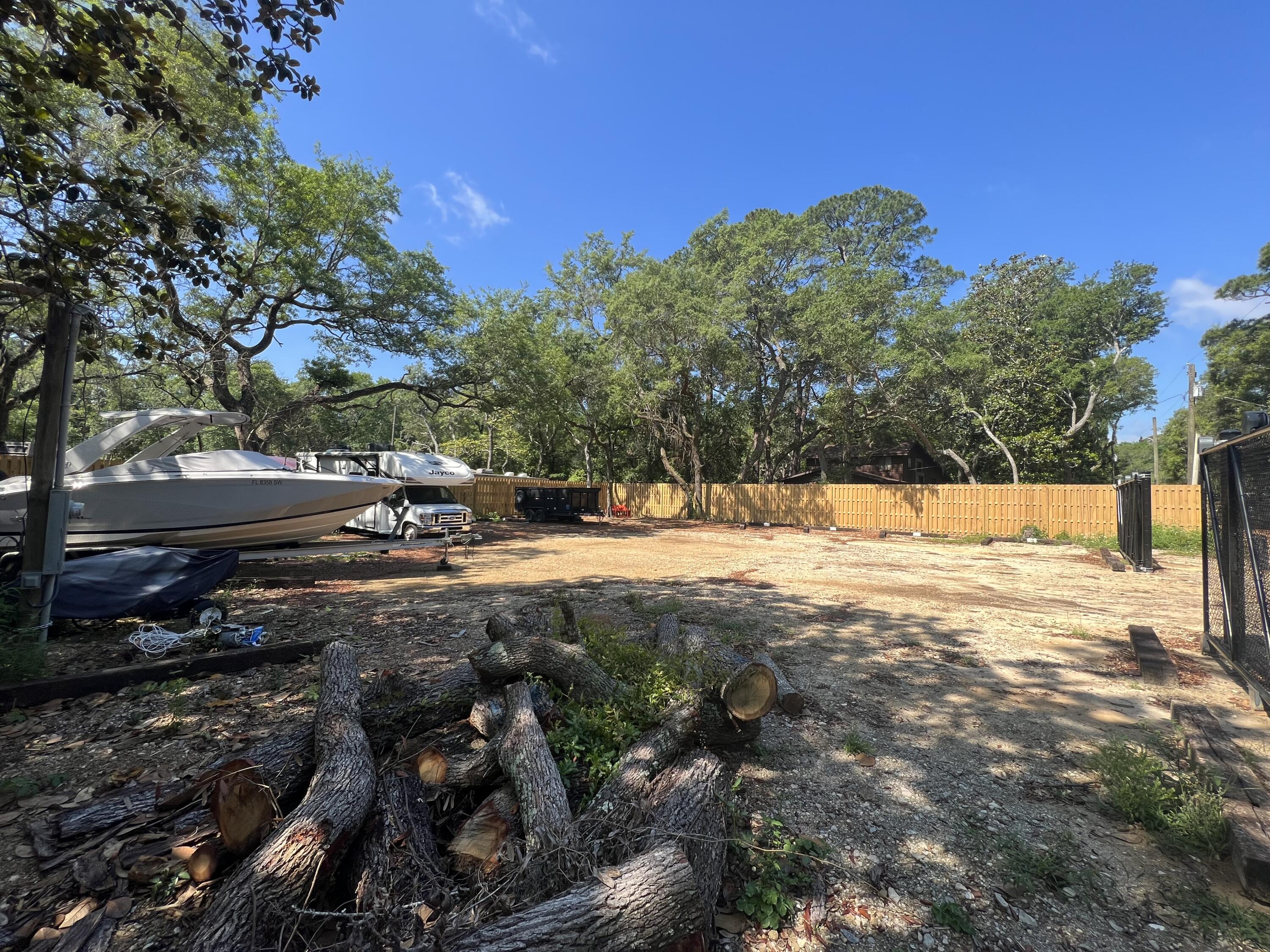 154 Madge Lane Santa Rosa Beach, FL 32459 - Photo 4 of 5 a view of road with trees