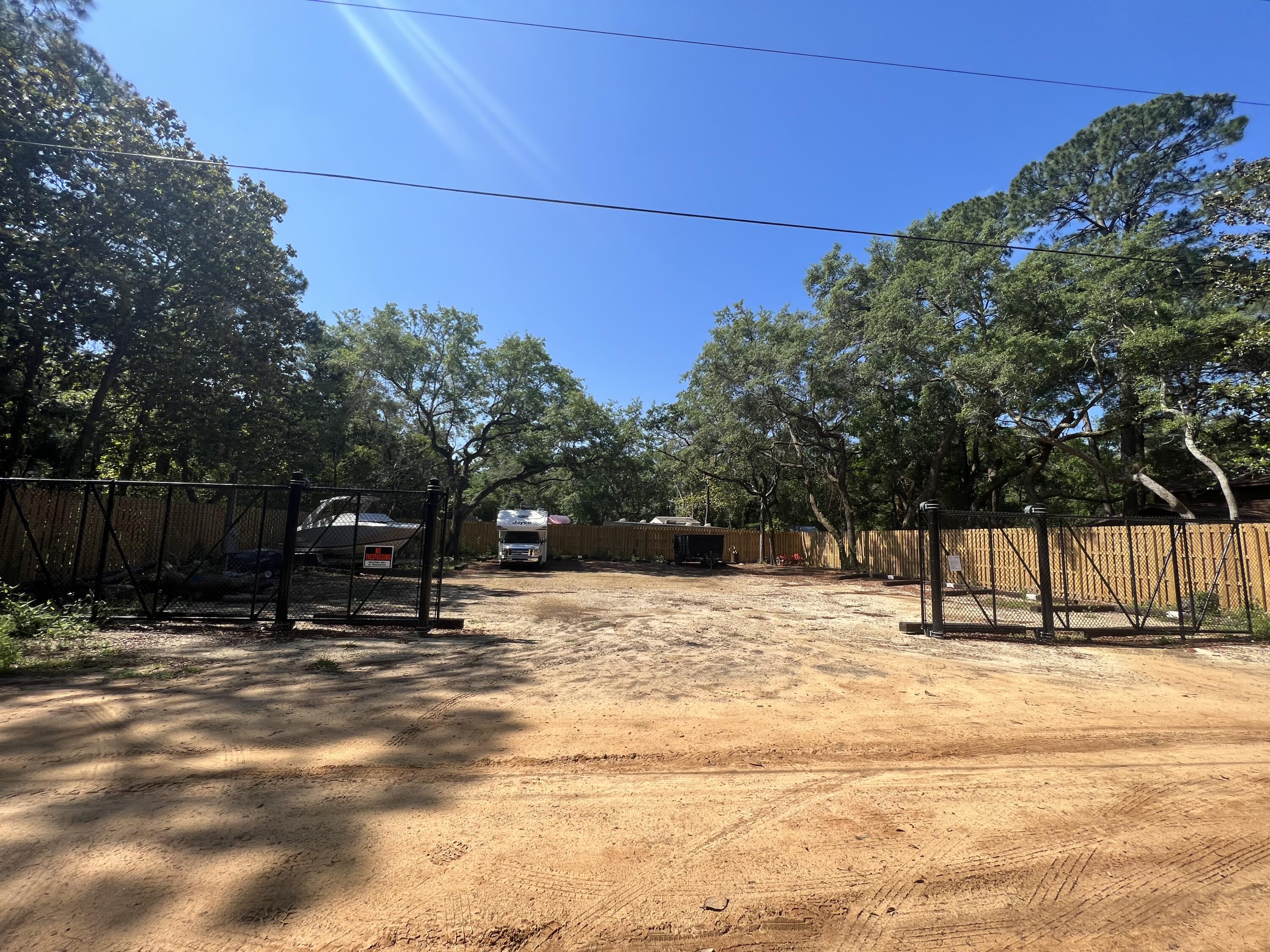 154 Madge Lane Santa Rosa Beach, FL 32459 - Photo 5 of 5 a swimming pool with a outdoor seating