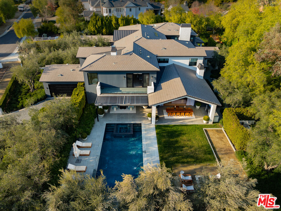 25210 Jim Bridger Road Hidden Hills, CA 91302 - Photo 61 of 65 an aerial view of a house with a yard