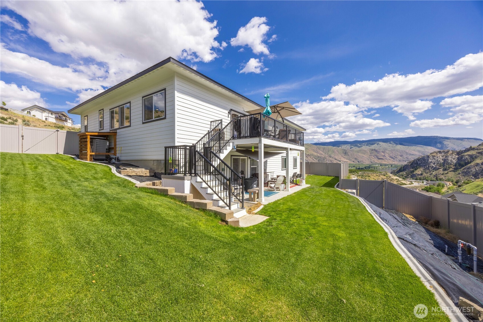 9968 Griffith Place Entiat, WA 98822 - Photo 33 of 38 a view of a house with a yard