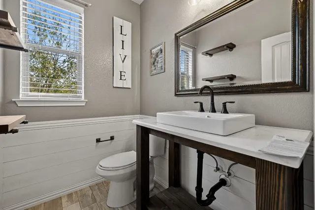 a view of a dining area with furniture window and wooden floor
