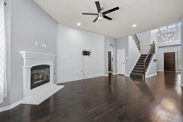 a view of kitchen with cabinets and wooden floor