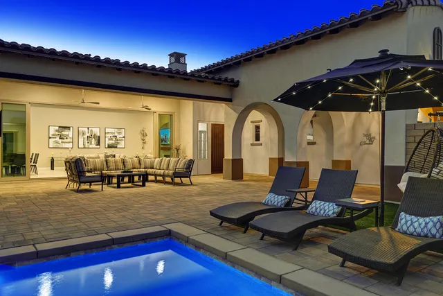 a living room with furniture and flat screen tv