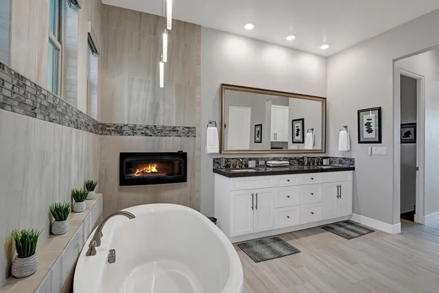 a view of a livingroom with furniture and a window