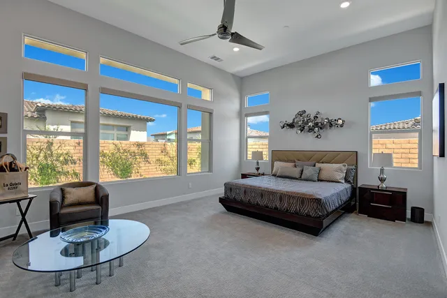 a kitchen with granite countertop a sink and cabinets