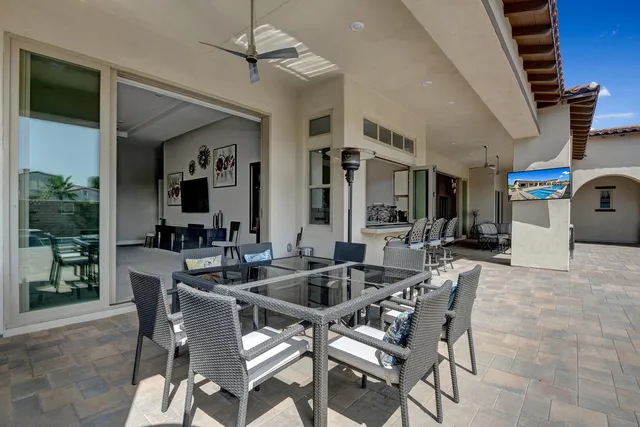 a outdoor living space with furniture and a potted plant