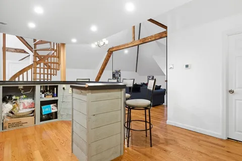 a room with table and chairs