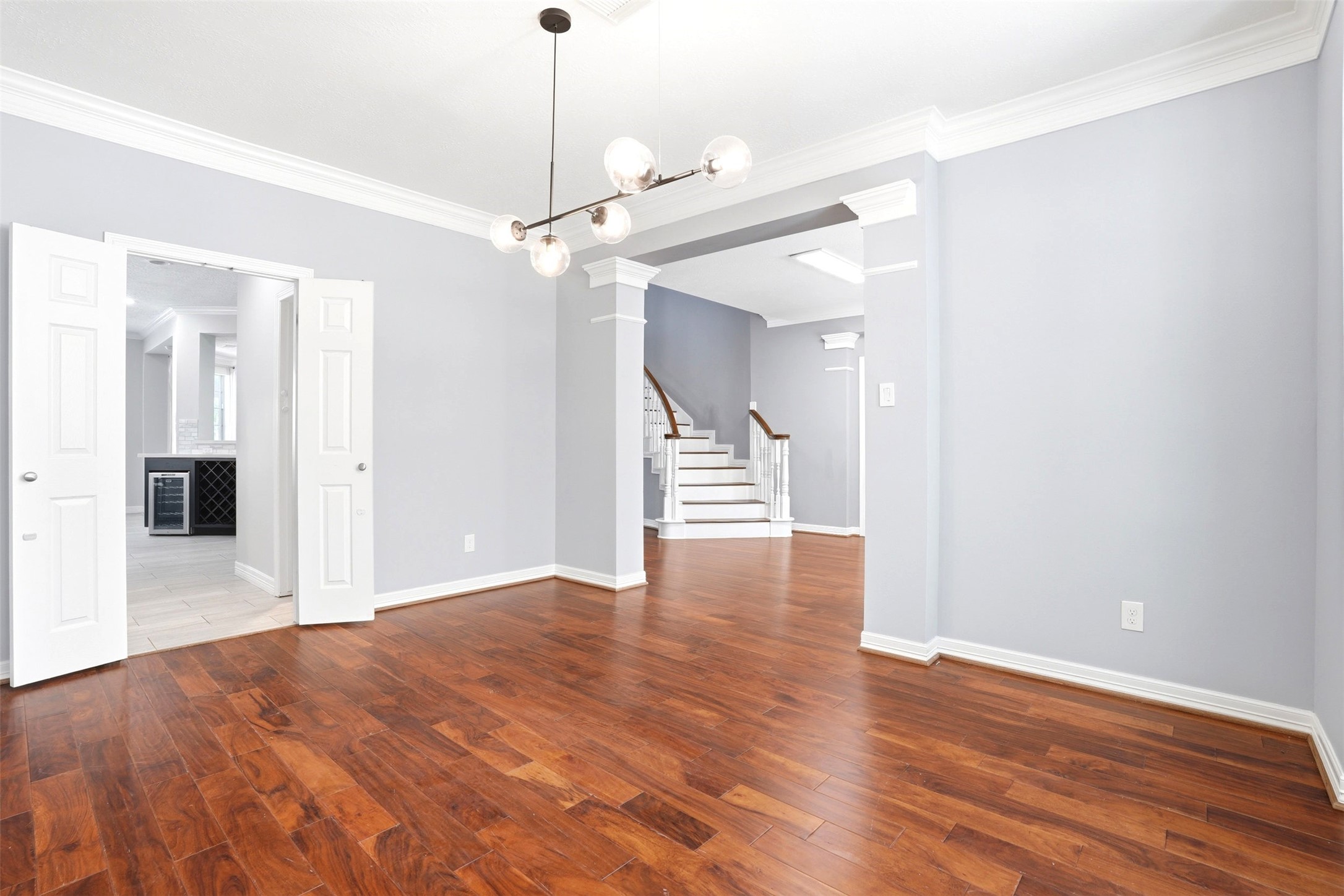 4707 Stackstone Lane Katy, TX 77450 - Photo 49 of 50 a view of a livingroom with wooden floor and a ceiling fan