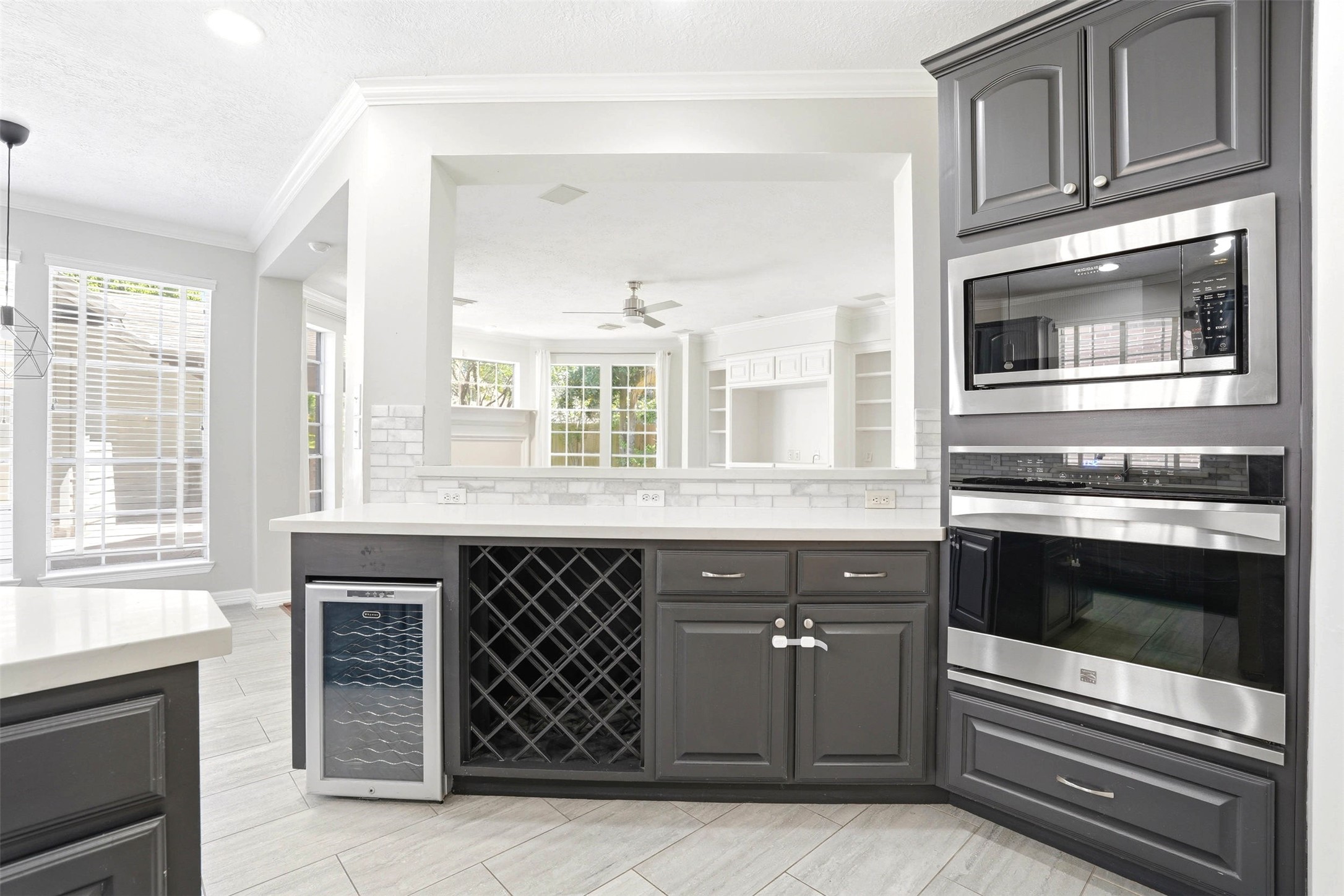 4707 Stackstone Lane Katy, TX 77450 - Photo 16 of 50 Custom wine rack and wine fridge