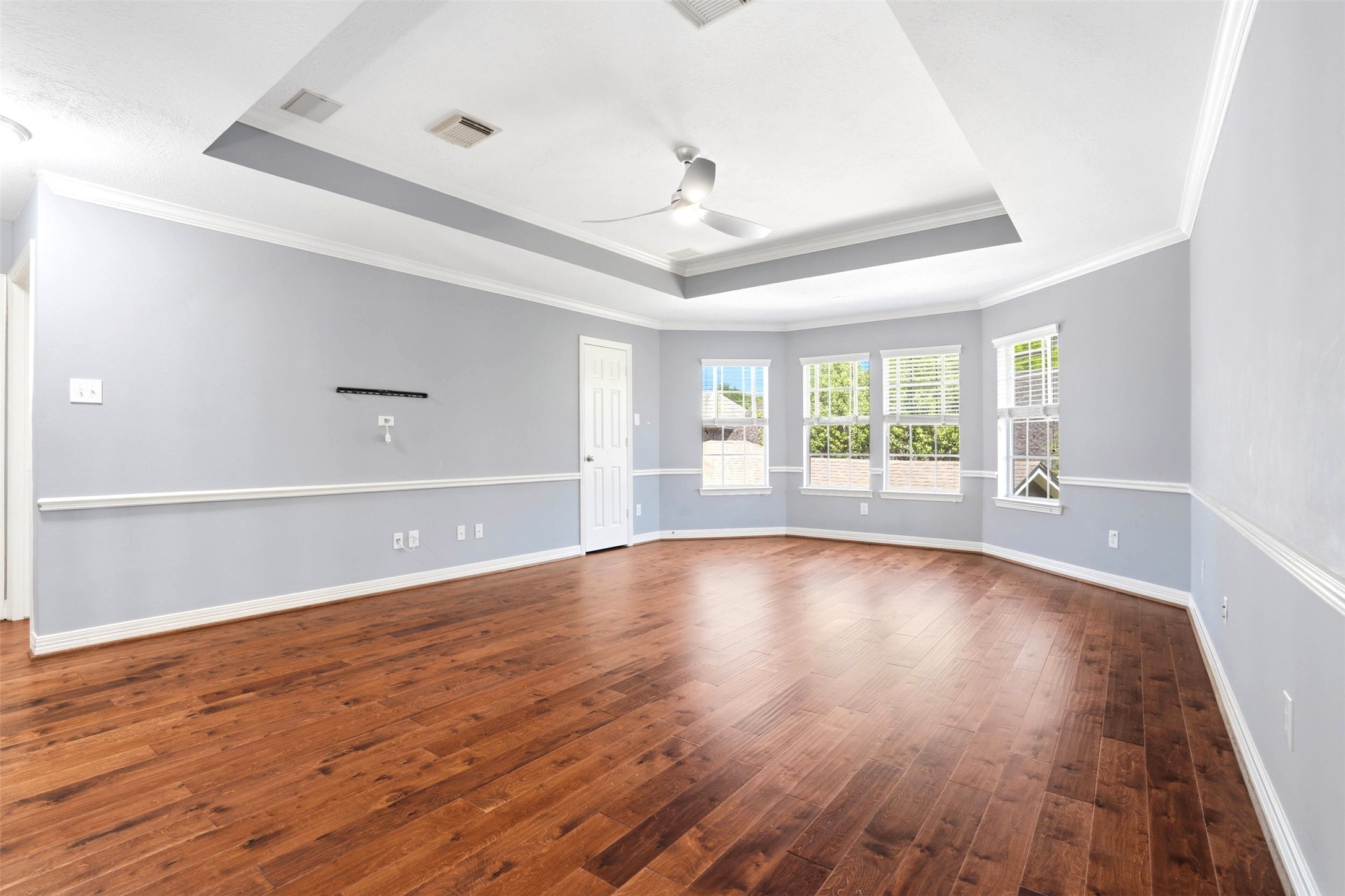 4707 Stackstone Lane Katy, TX 77450 - Photo 26 of 50 wooden floor in an empty room with a window