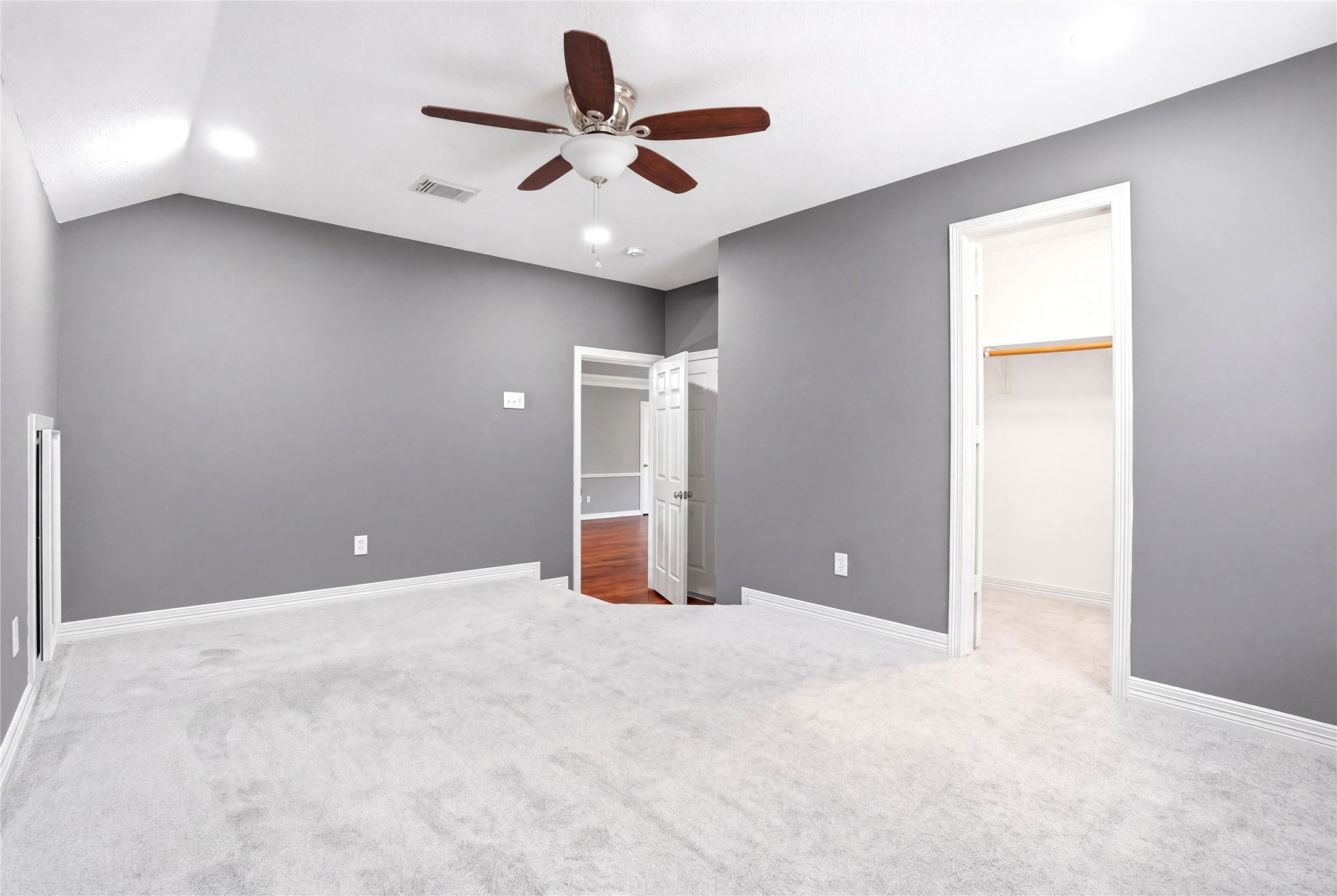4707 Stackstone Lane Katy, TX 77450 - Photo 28 of 50 an empty room with a ceiling fan and window