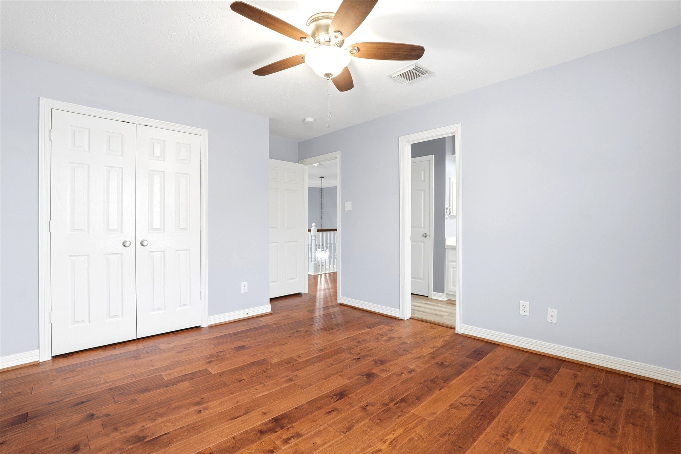 4707 Stackstone Lane Katy, TX 77450 - Photo 30 of 50 wooden floor in an empty room with a window