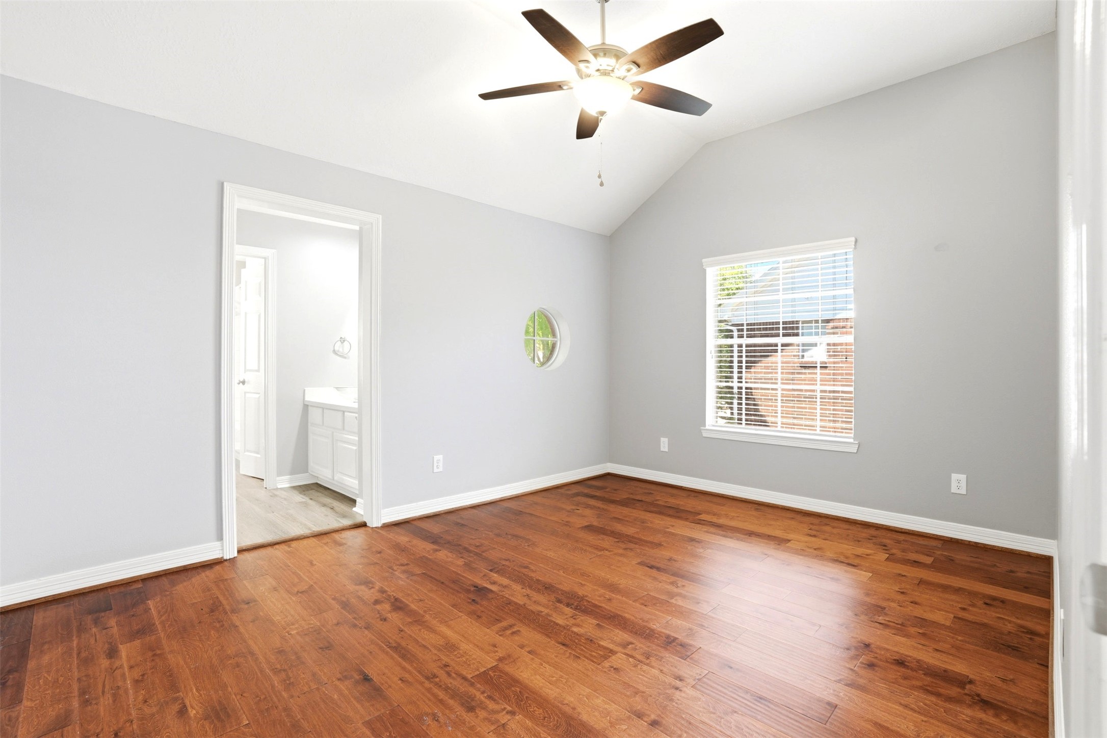 4707 Stackstone Lane Katy, TX 77450 - Photo 31 of 50 a view of empty room with wooden floor and fan