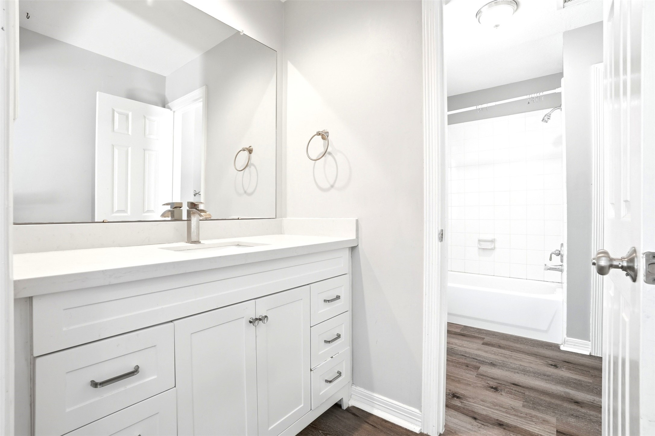 4707 Stackstone Lane Katy, TX 77450 - Photo 32 of 50 a bathroom with a double vanity sink and mirror