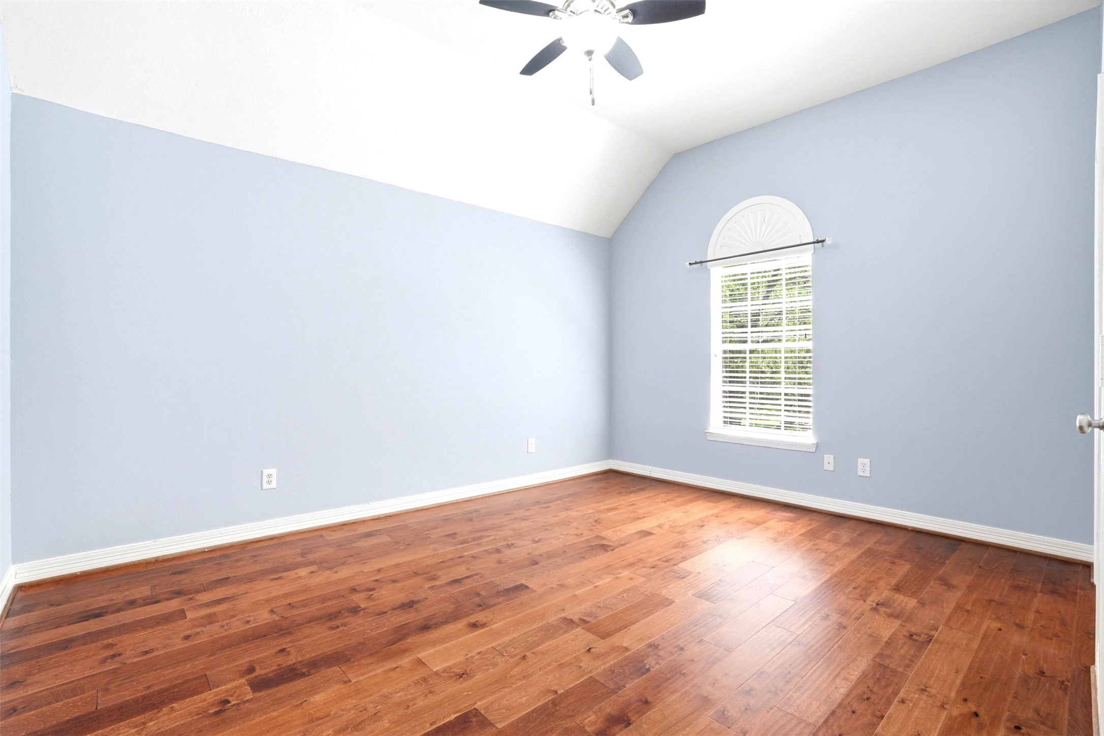 4707 Stackstone Lane Katy, TX 77450 - Photo 34 of 50 wooden floor in an empty room with a window