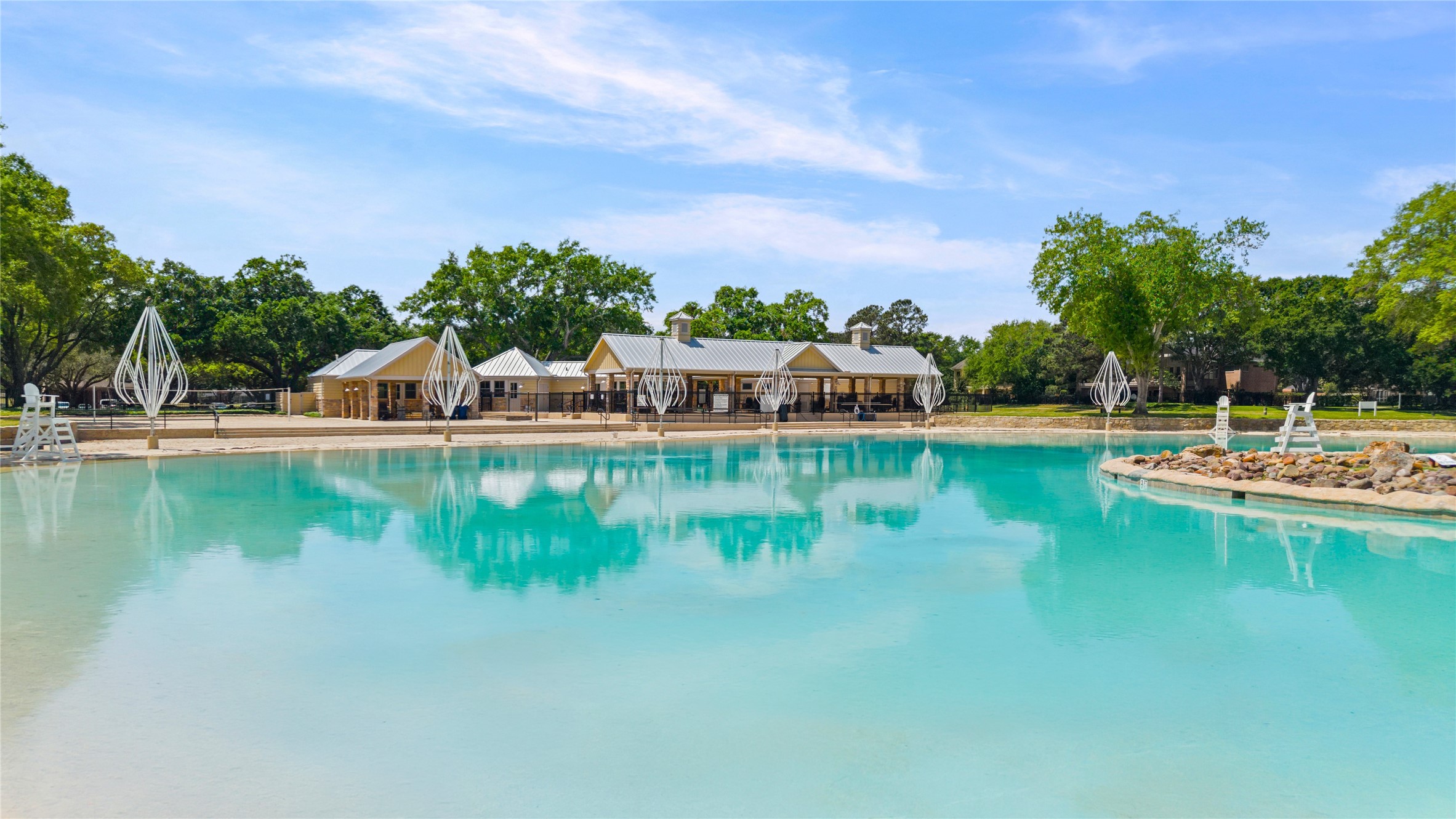 4707 Stackstone Lane Katy, TX 77450 - Photo 37 of 50 a view of a lake with houses in the back