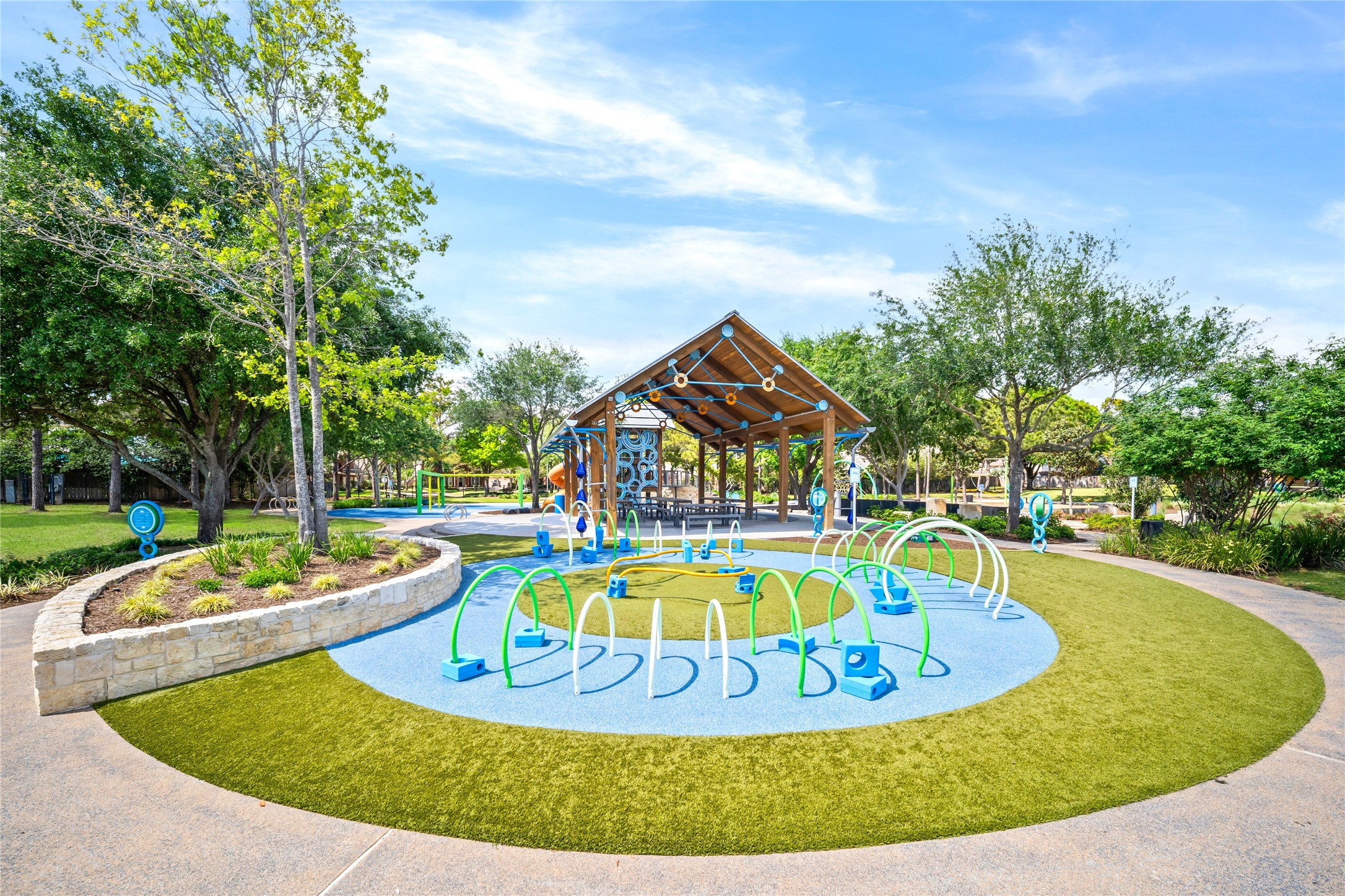 4707 Stackstone Lane Katy, TX 77450 - Photo 47 of 50 a view of a swimming pool with a garden and plants