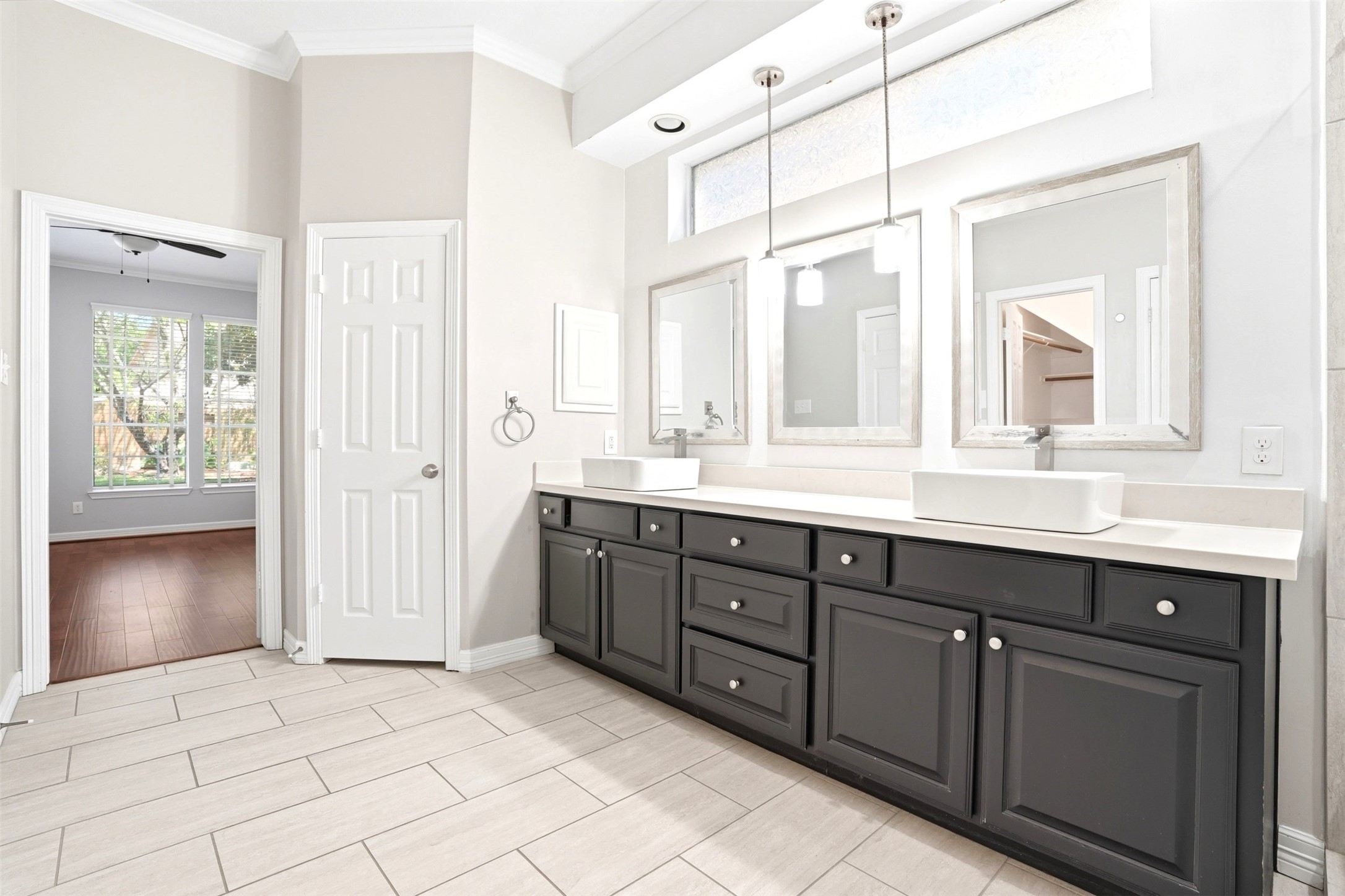 4707 Stackstone Lane Katy, TX 77450 - Photo 6 of 50 a spacious bathroom with a granite countertop sink mirror and