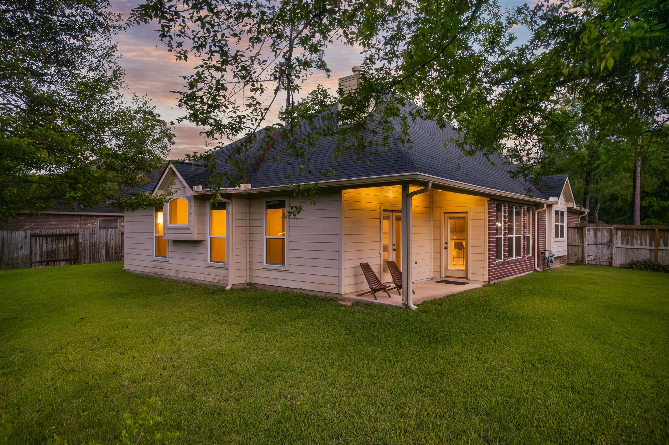 629 Spring Forest Drive Conroe, TX 77302 - Photo 26 of 39 Backyard is completely fenced!