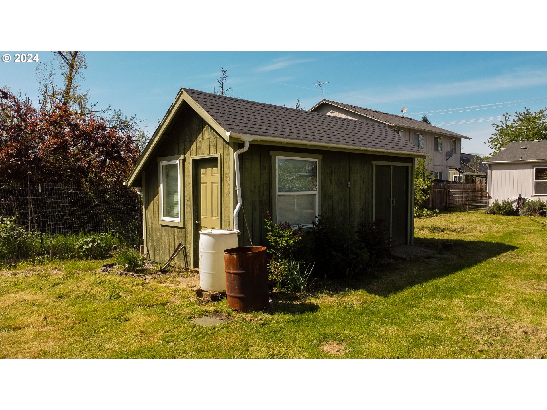 6401 Main Street Springfield, OR 97478 - Photo 39 of 41 a house view with a garden space