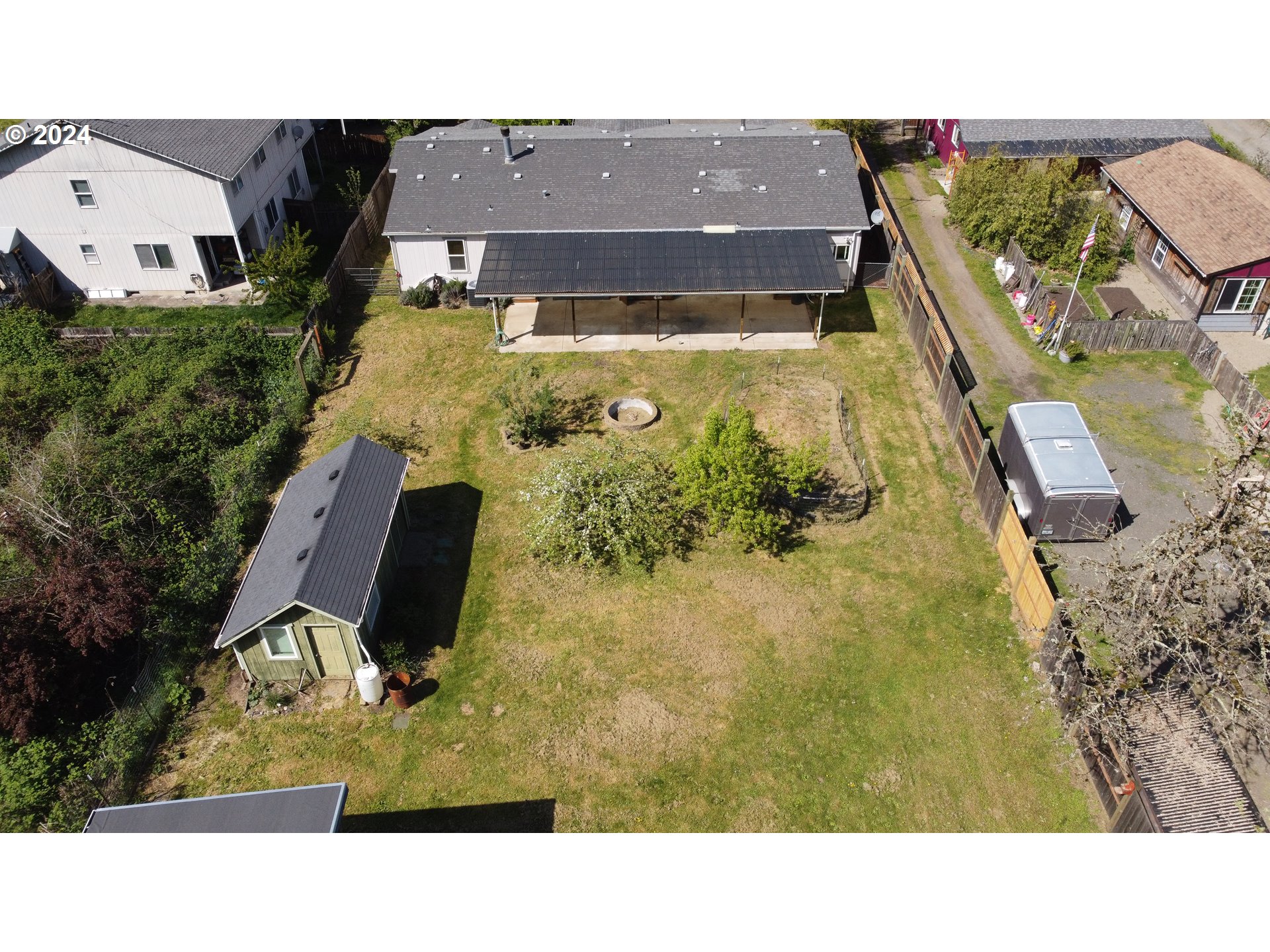 6401 Main Street Springfield, OR 97478 - Photo 40 of 41 a aerial view of a house with a swimming pool