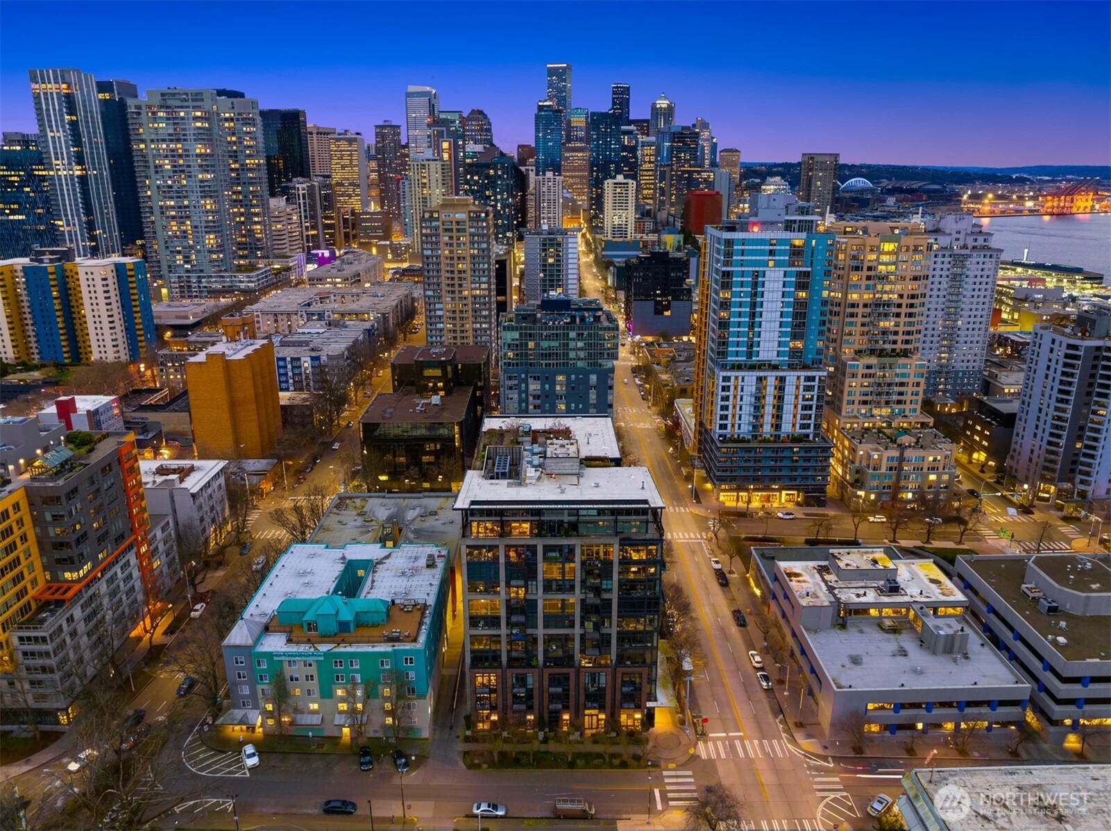 2720 3rd Avenue, Unit 505 Seattle, WA 98121 - Photo 21 of 25 a city street filled with lots of tall buildings