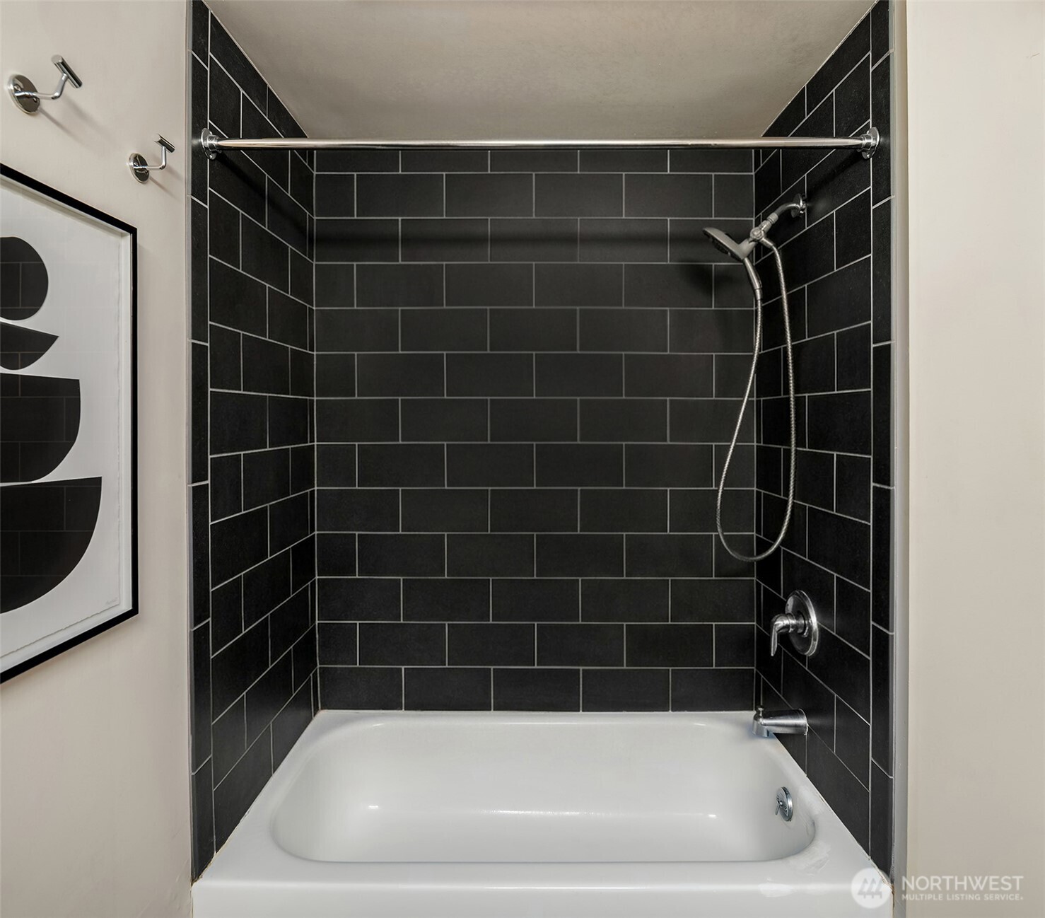 2720 3rd Avenue, Unit 505 Seattle, WA 98121 - Photo 10 of 25 a bathroom with a bath tub