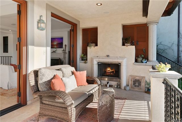 a view of balcony with furniture