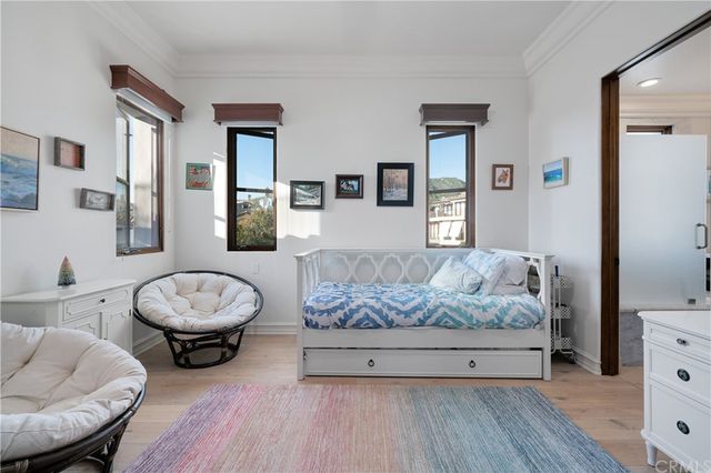 a kitchen with a refrigerator and a sink