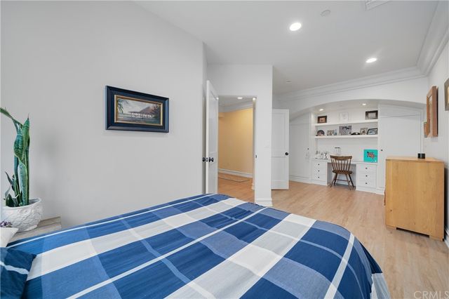 a bedroom with a bed and furniture