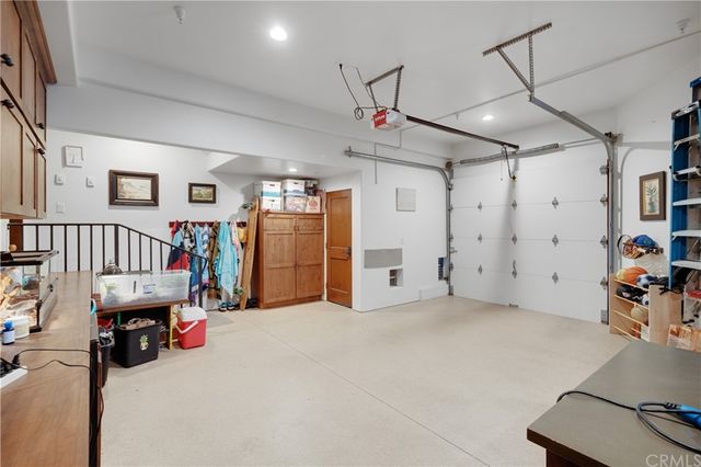 a view of a balcony with furniture