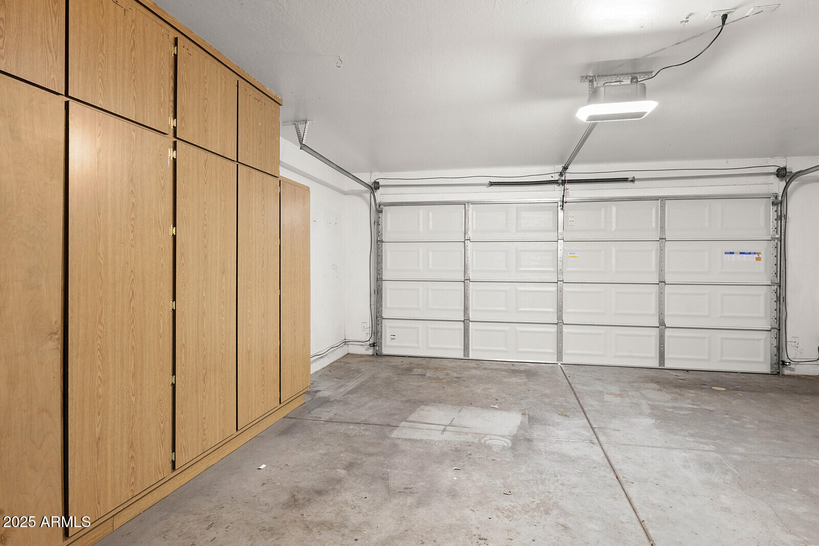 3297 East Warbler Road Gilbert, AZ 85297 - Photo 28 of 32 a view of a garage gate