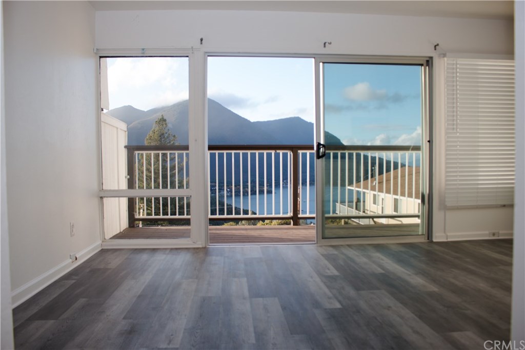 View from the living room window / balcony towards the lake - New laminate wood flooring and fresh paint.