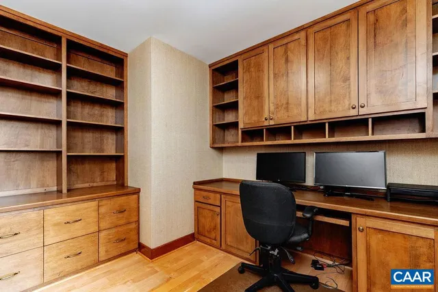 a view of workspace with wooden cabinet