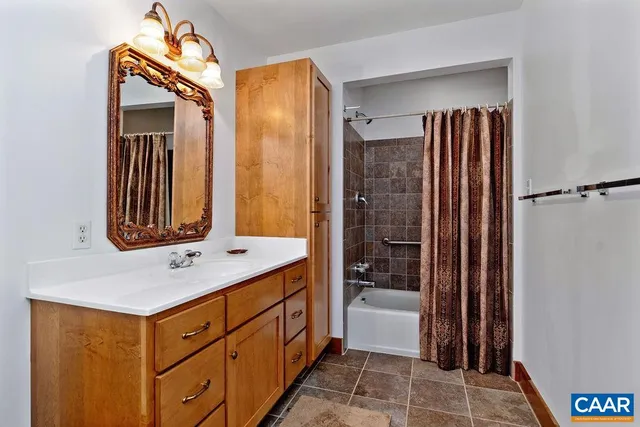 a view of porch with wooden floor in front of door